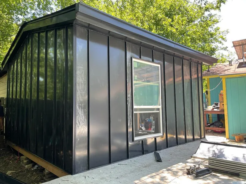 Black standing seam metal wall panels for Roof Inspection in Lyndon